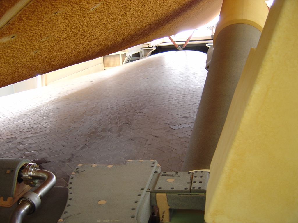 A unique view from crawling around in-between the Space Shuttle External Tank and the Shuttle Orbiter Discovery, taken June 25, 2005 at the launch pad, looking straight up.