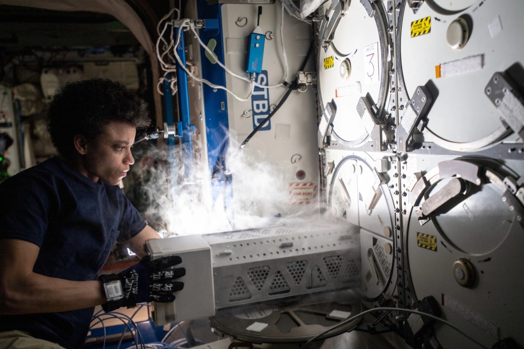 NASA astronaut Jessica Watkins conducting experiments on the International Space Station.